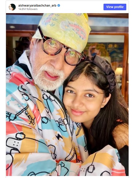 আরাধ্যাকে তার দাদু অমিতাভ বচ্চনকে জড়িয়ে ধরে আছে।  ছবি: সংগৃহীত